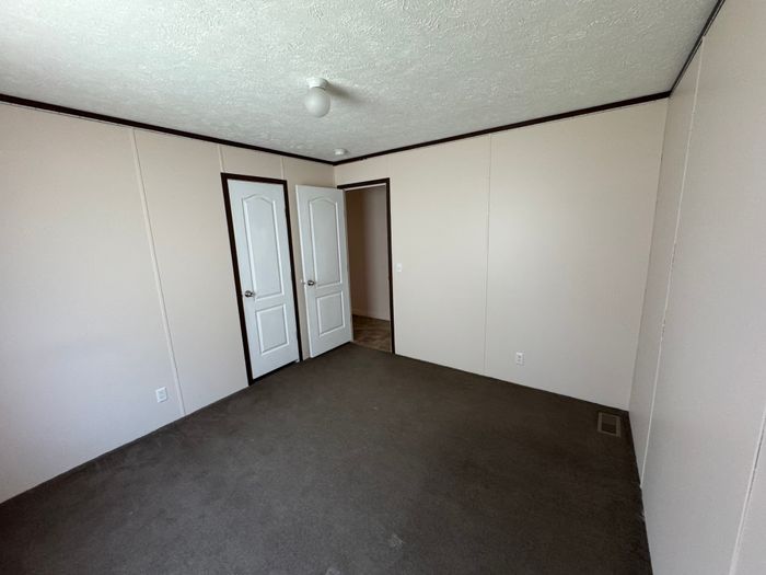 Alliance Vista MH and RV Park - Unit J7 - Bedroom