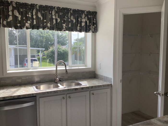 Lakewood Village MHC and RV Resort - Unit 205 - Kitchen